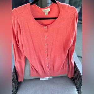 Button down cardigan in the color peach